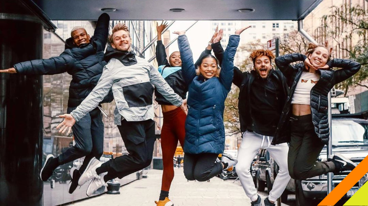 Six students jump in the air. 